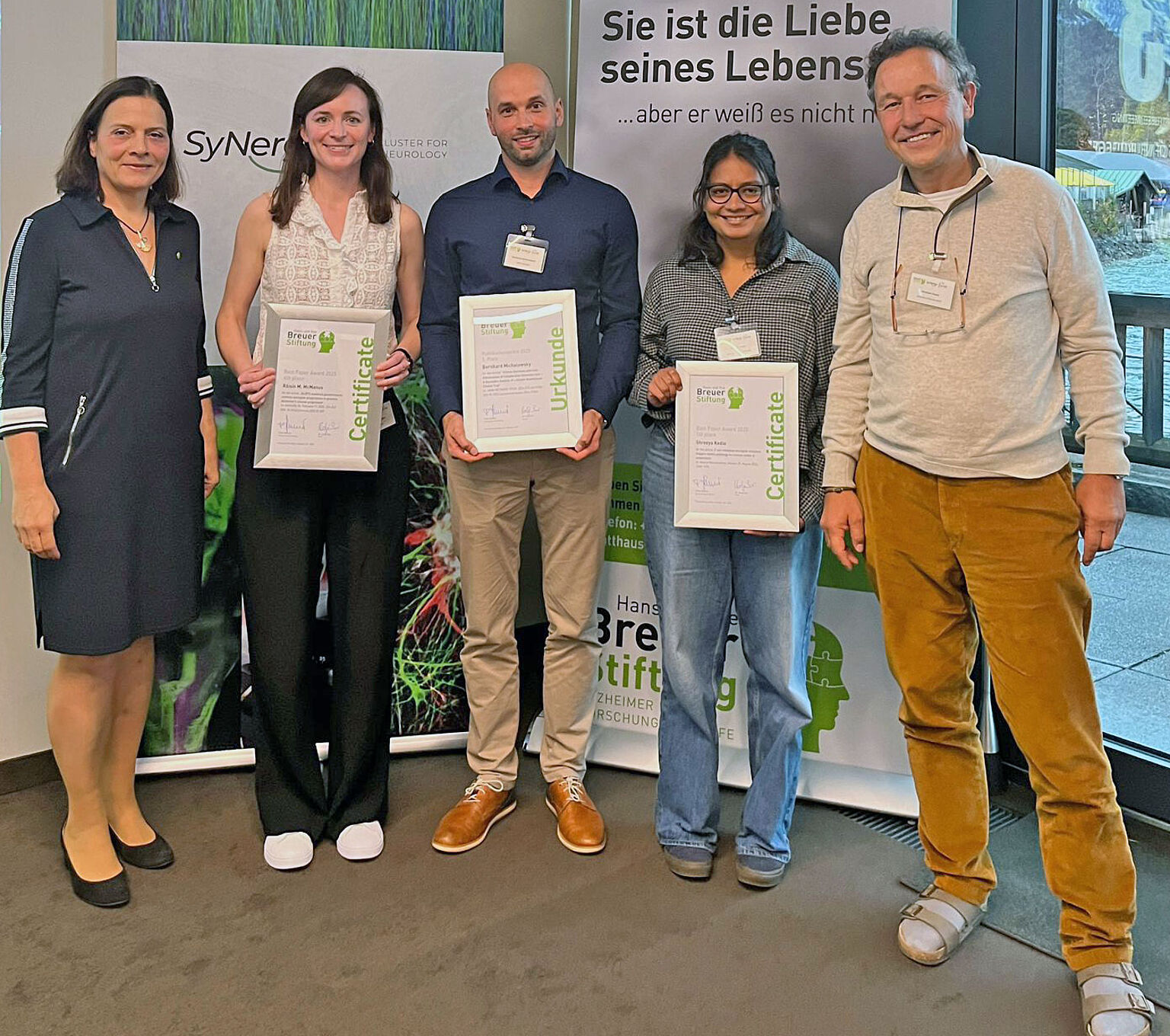 Three of the four award winners can be seen in the picture.