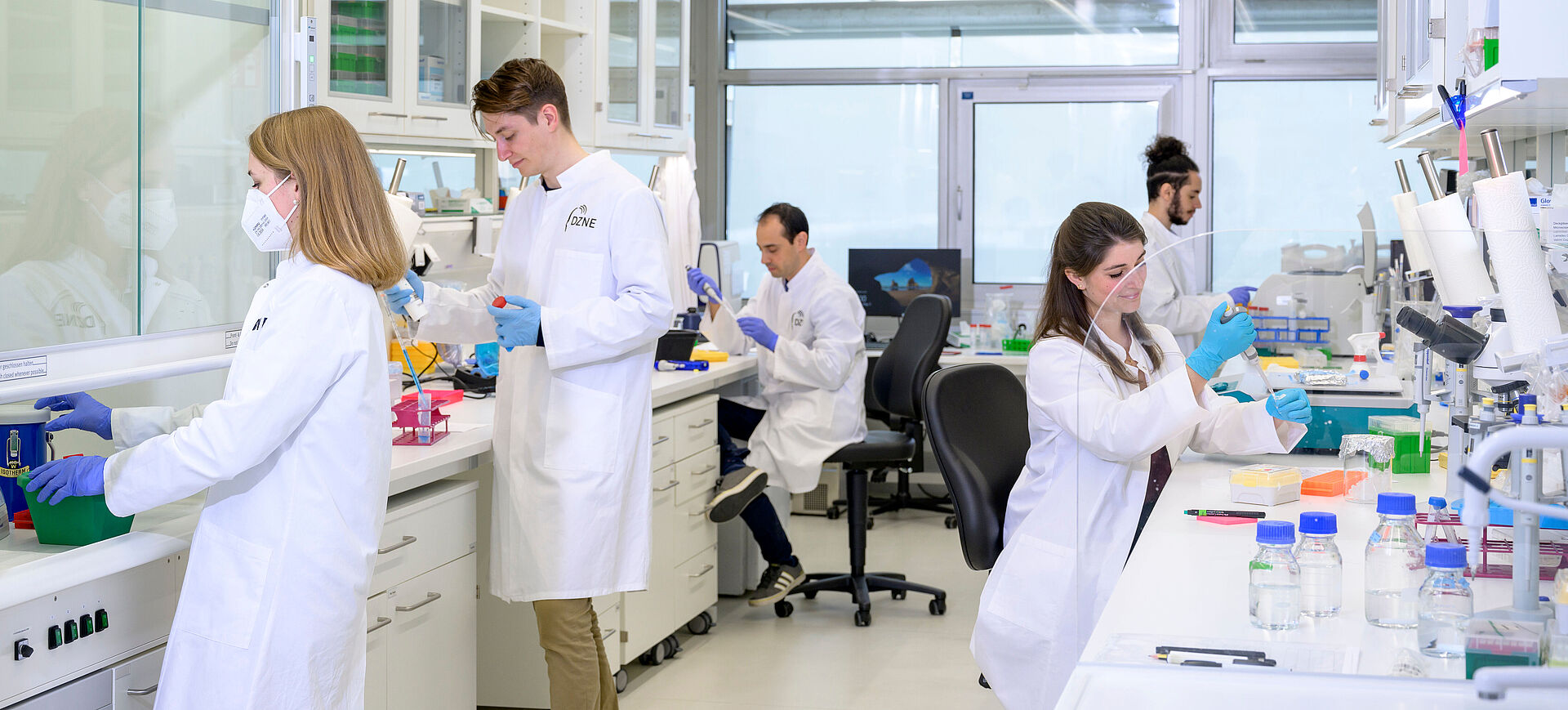Picture shows researchers in the lab.